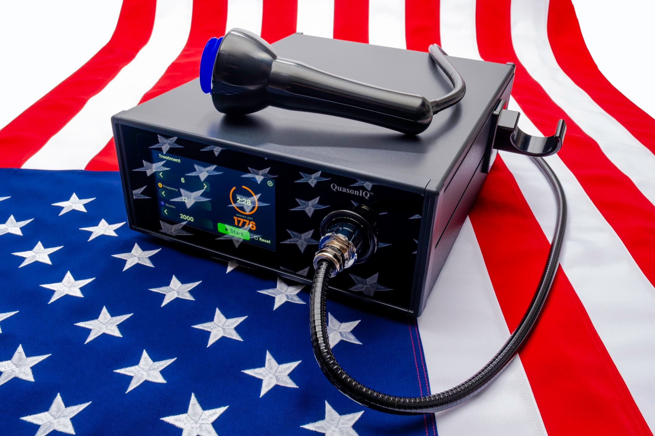QuasoniQ+™ console on the American flag, display reading 1776