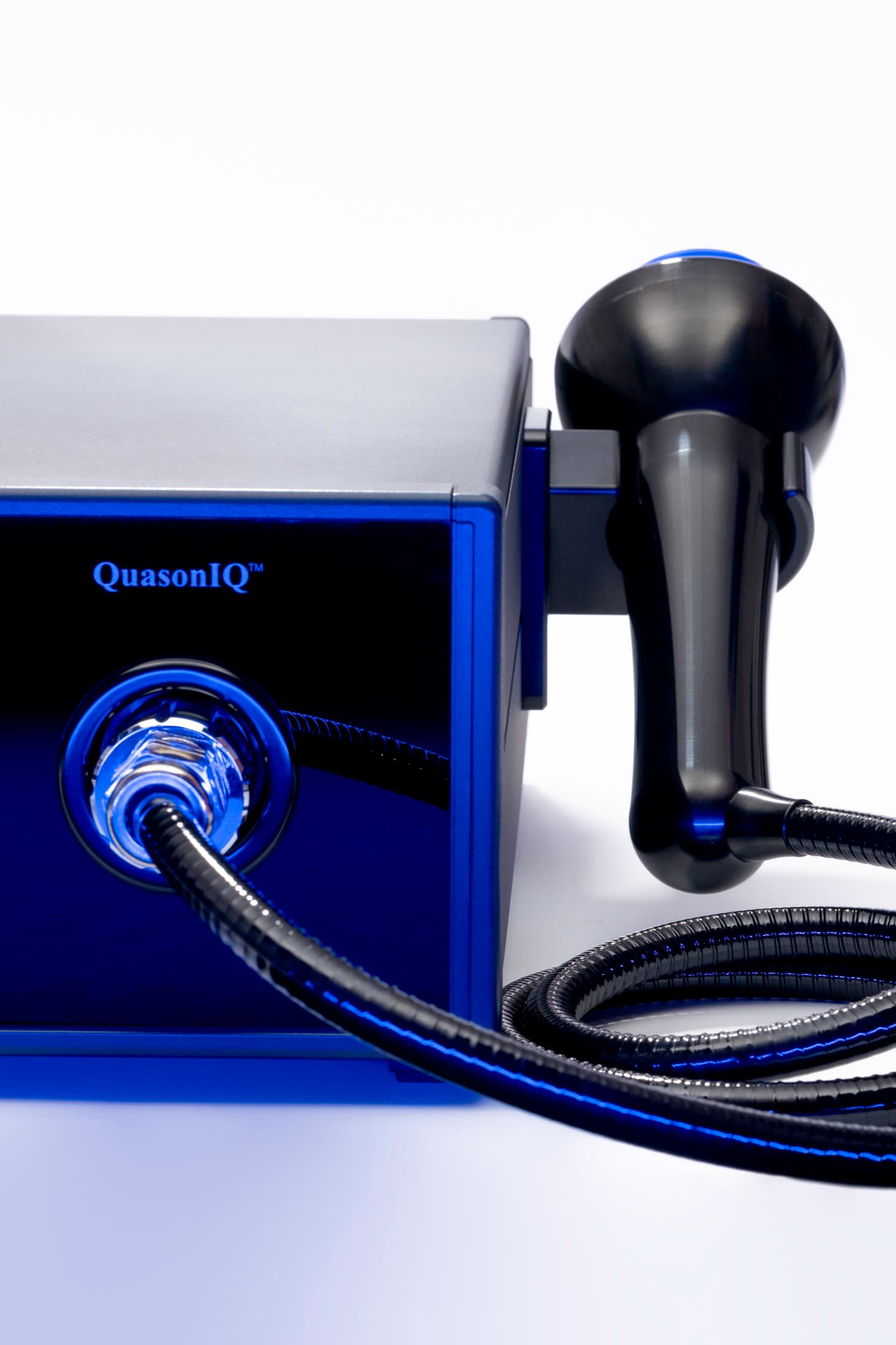 QuasoniQ+™ console and docked handpiece in cobalt studio light